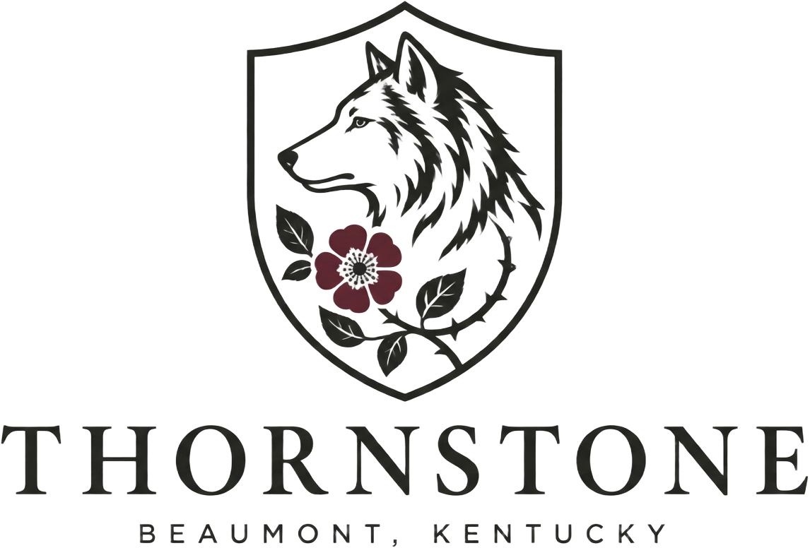 Thornstone Kennel & Boarding crest — wolf and rose shield, Beaumont, Kentucky